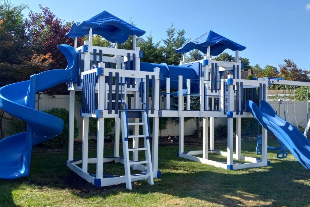 Cool Backyard Playground with Swings and Towers