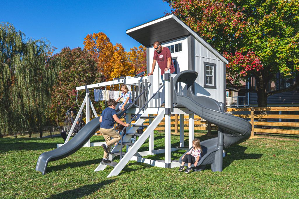 Cool outdoor swingset with hideout playhouse